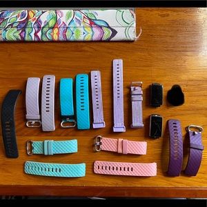 Two Fitbit Charge 3s plus accessories